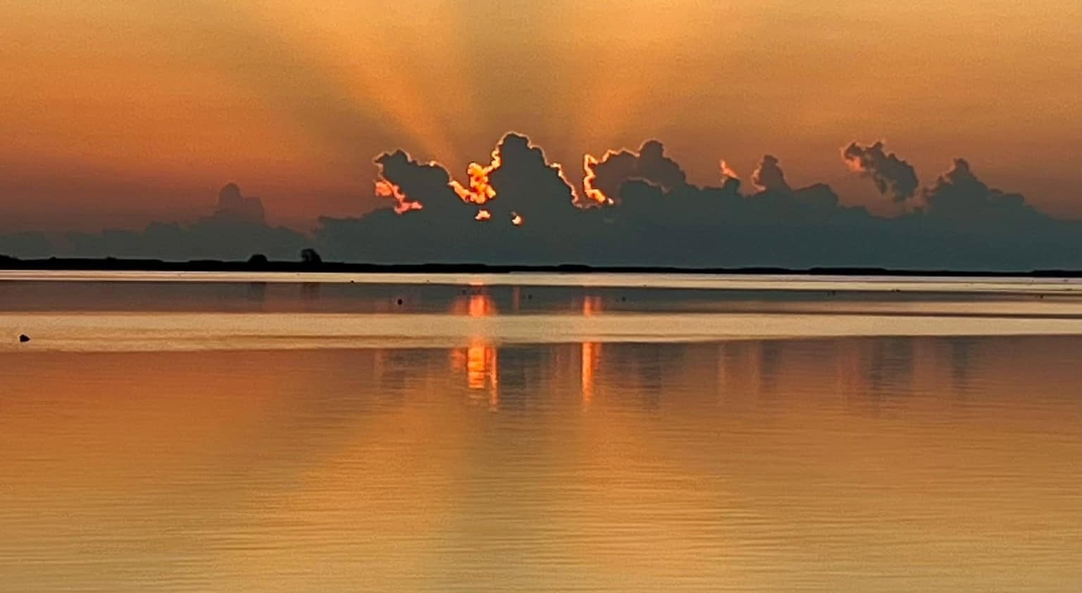 Sunrising behind the clouds